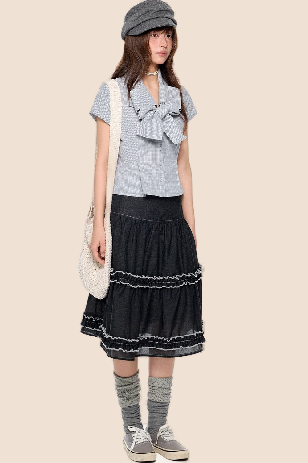 Blusa preppy a righe con fiocco