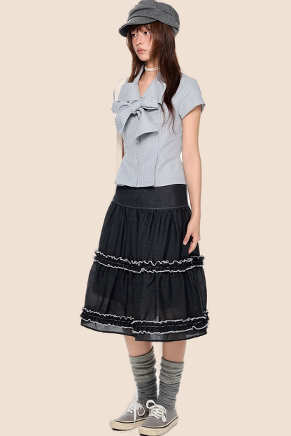 Blusa preppy a righe con fiocco