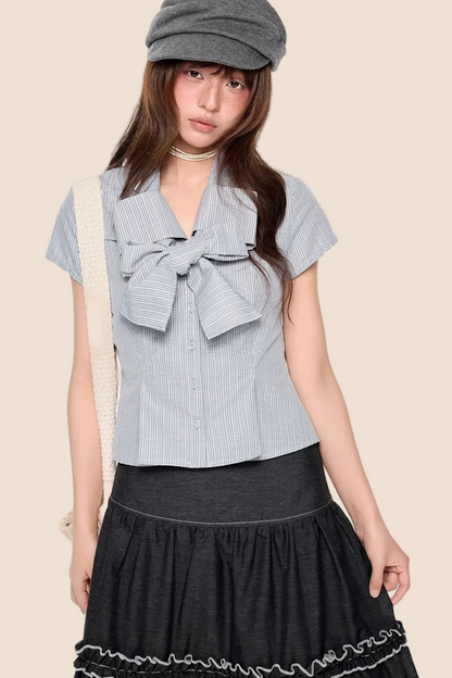 Blusa preppy a righe con fiocco