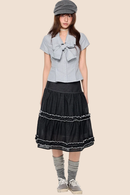 Blusa preppy a righe con fiocco