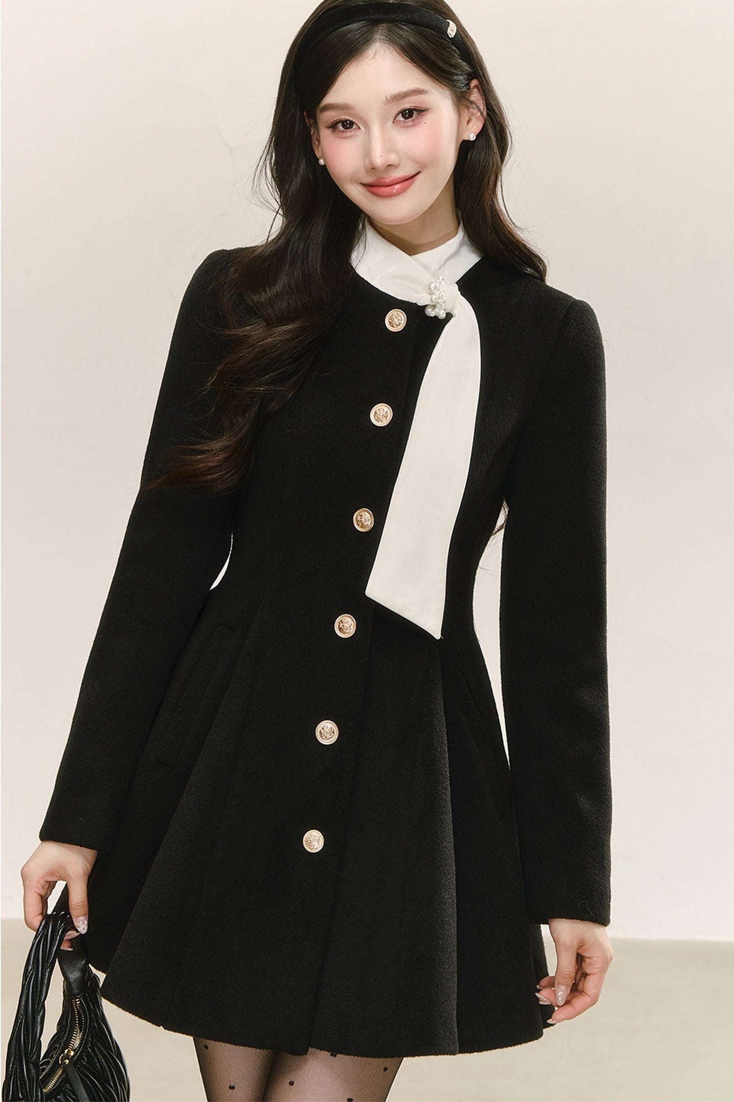 Abito cappotto imbottito in lana nero