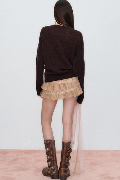 Unregelmäßiger Wollpullover mit Schalkragen