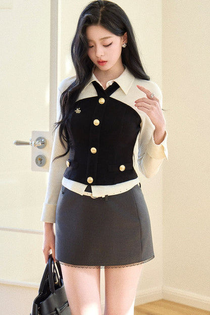 Top elegante nero e bianco a blocchi di colore
