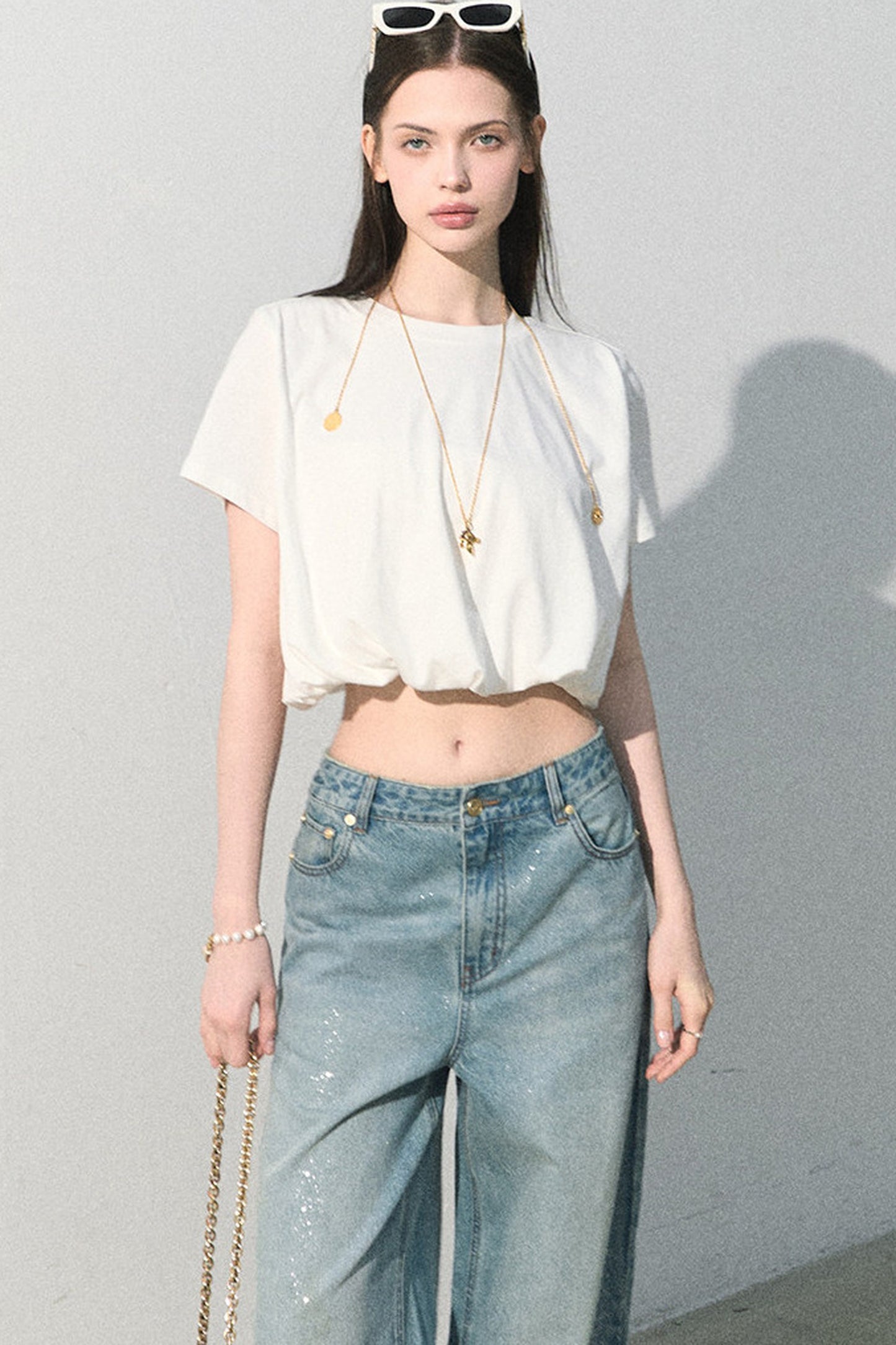 Blusa in lino plissettata a bocciolo