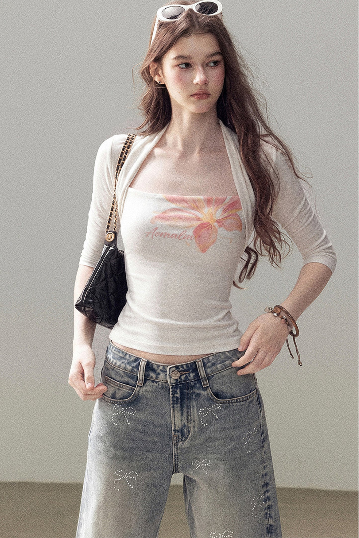 Top cardigan a maniche corte con stampa floreale