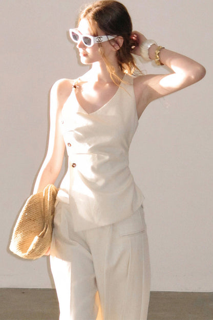 Completo con top smanicato con spalle a nuvola e pantaloni