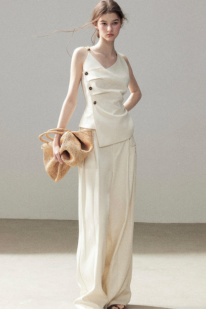 Completo con top smanicato con spalle a nuvola e pantaloni