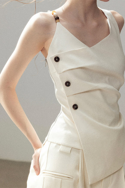 Completo con top smanicato con spalle a nuvola e pantaloni