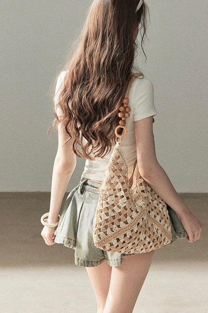 T-shirt a maniche corte con fiocco di strass