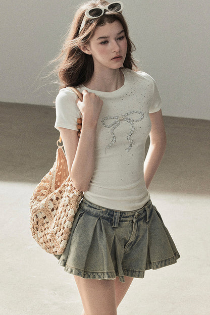 T-shirt a maniche corte con fiocco di strass