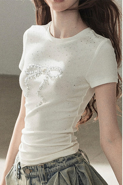 T-shirt a maniche corte con fiocco di strass