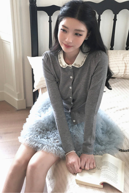 Strickjacke mit Bubikragen und Stufenrock-Set