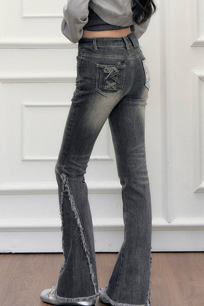 Jean évasé taille haute délavé à franges