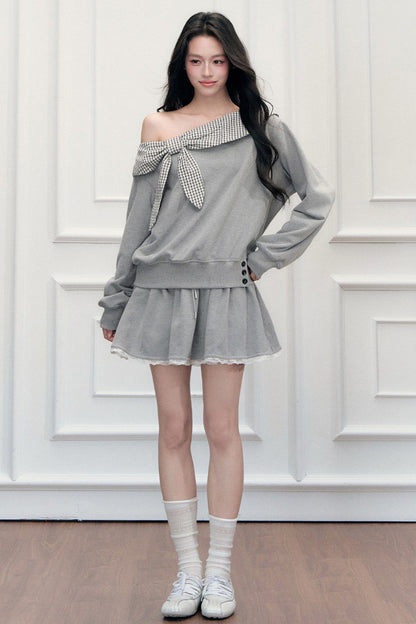Ensemble sweatshirt épaules dénudées et jupe patchwork à carreaux