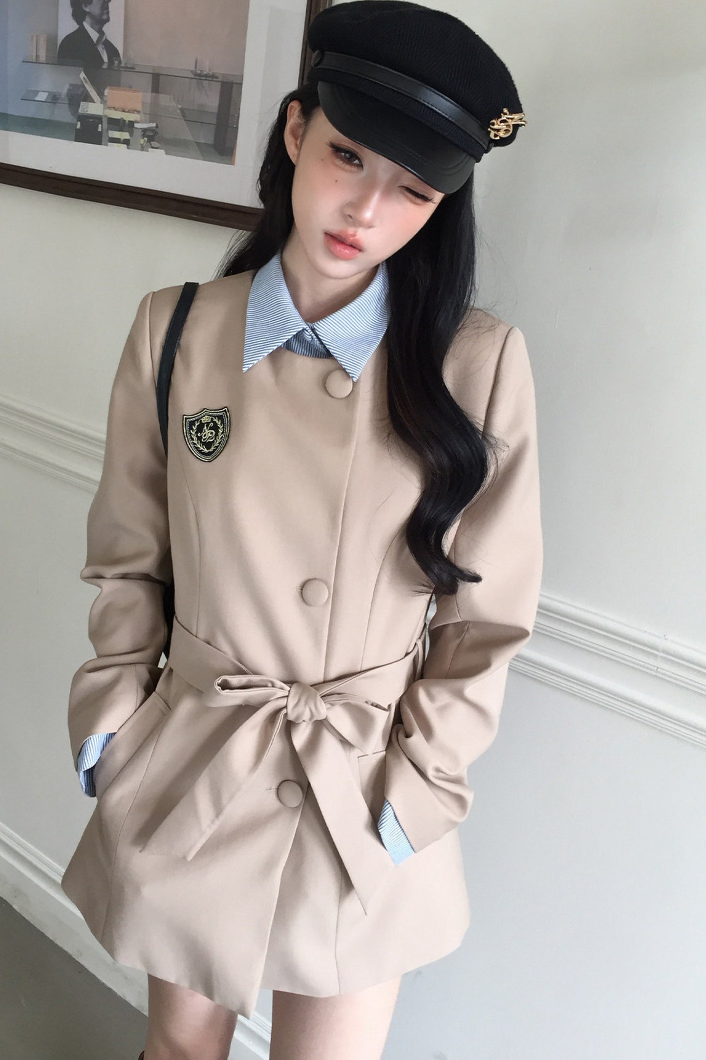 Blazer à nœud cintrant la taille