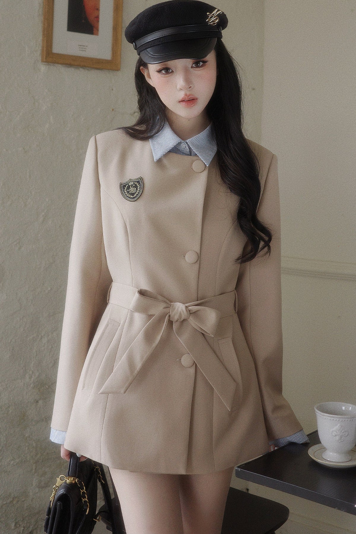 Blazer à nœud cintrant la taille