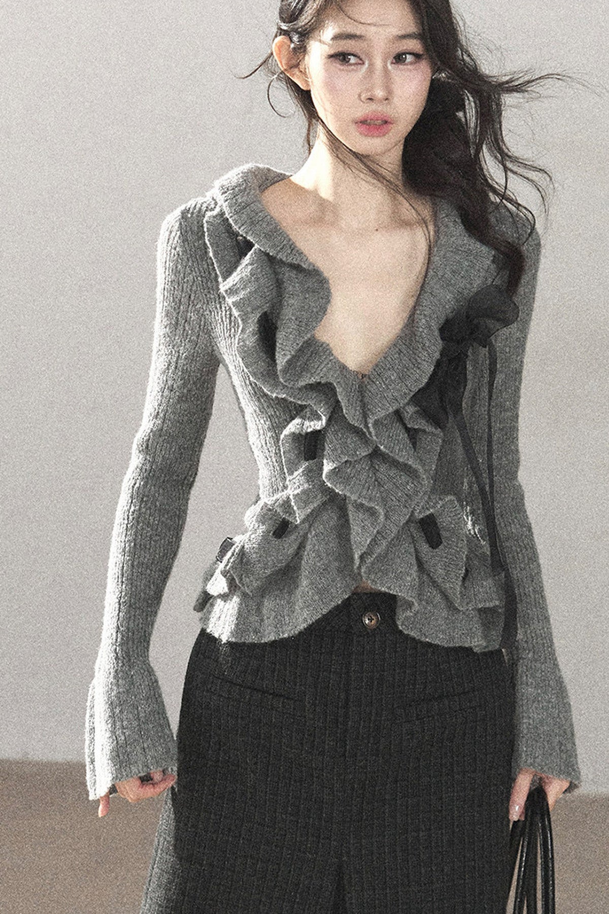 Pull court en maille à volants
