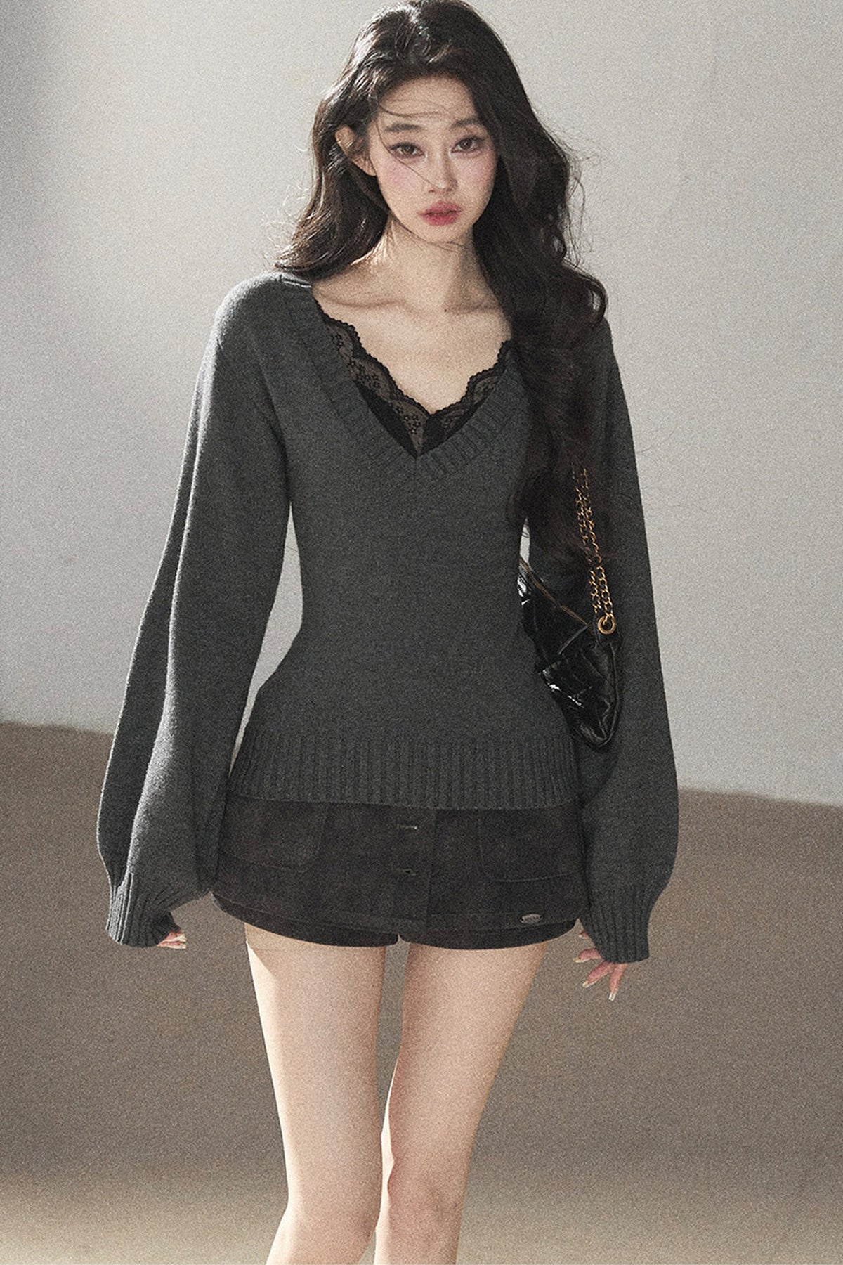 Top a maglia con scollo a V e maniche lunghe