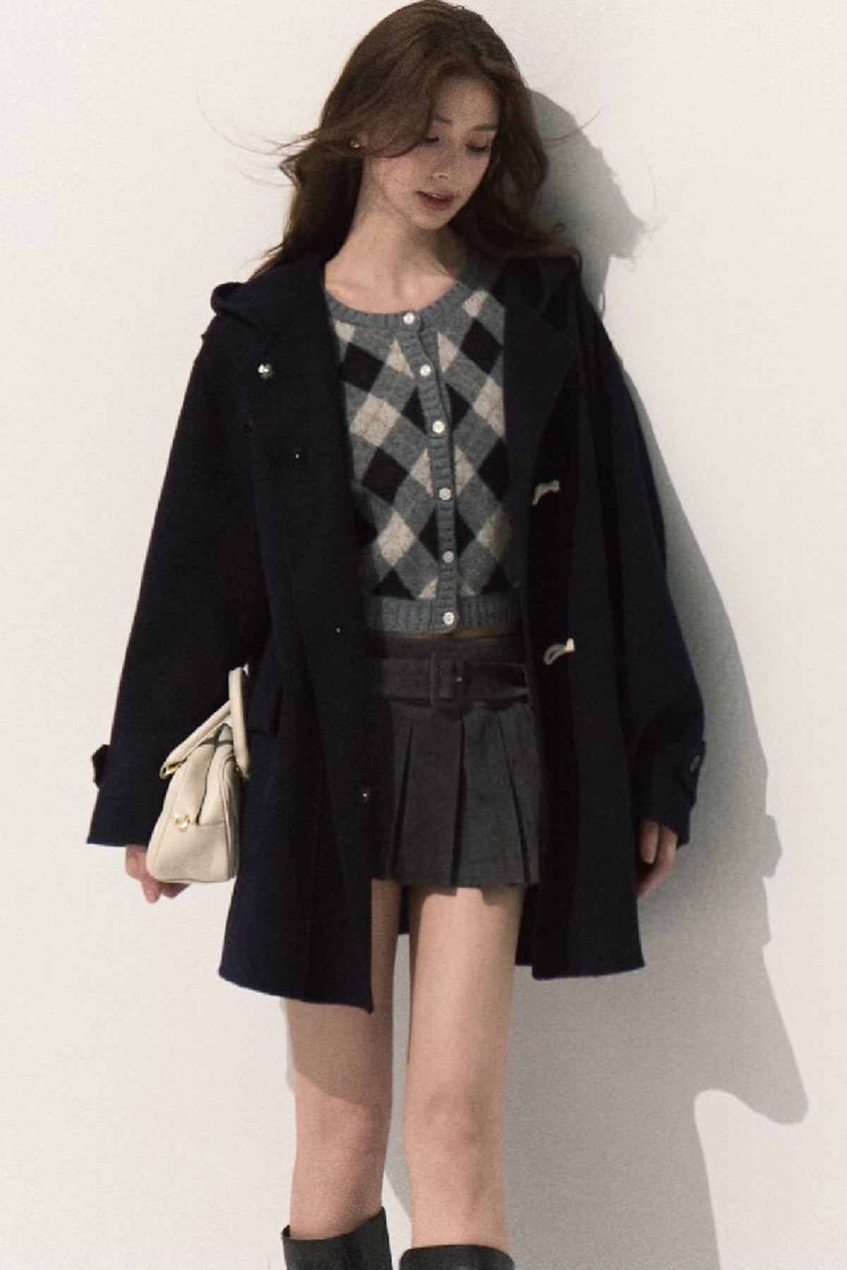Manteau en laine à capuche avec brandebourgs