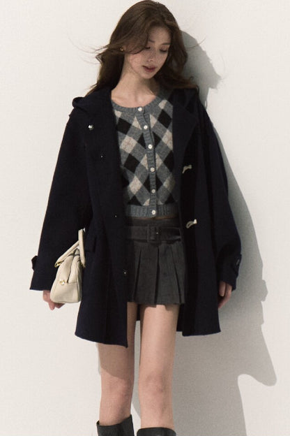 Manteau en laine à capuche avec brandebourgs