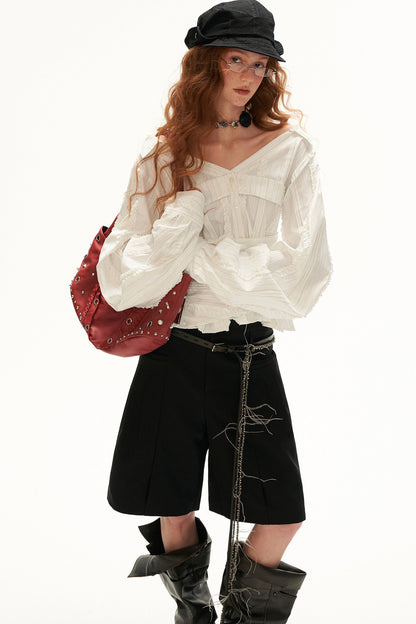 Blouse épaules dénudées à volants effet superposé