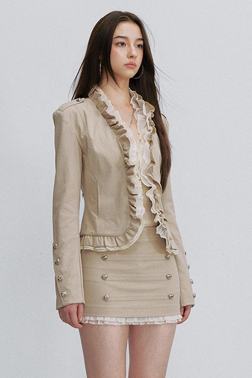 Chaqueta de malla con volantes y retales