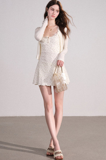 Completo con cardigan smanicato e pantaloni eleganti