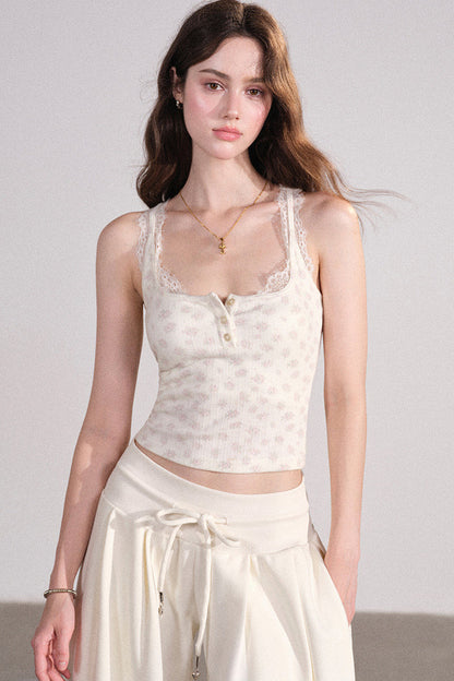 Completo con cardigan smanicato e pantaloni eleganti