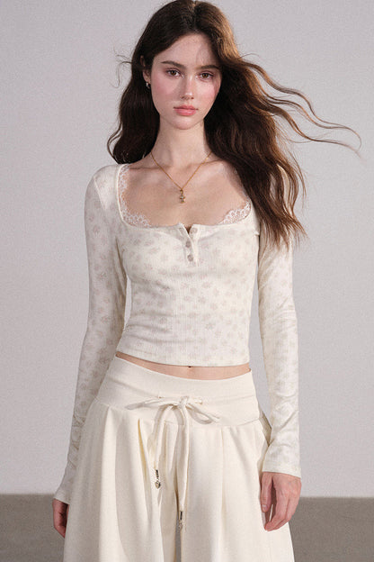 Completo con cardigan smanicato e pantaloni eleganti