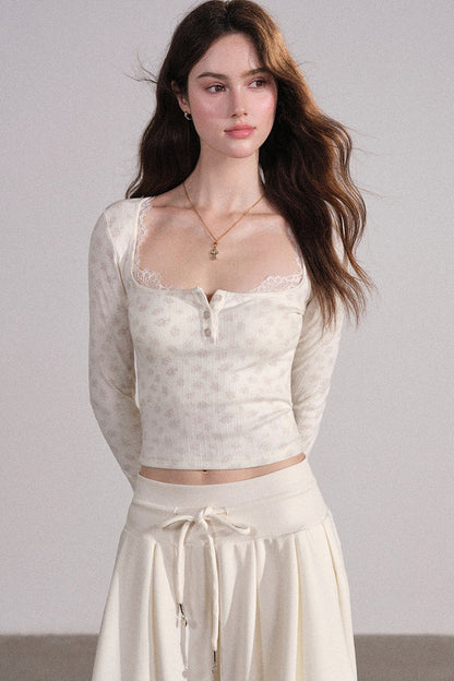 Completo con cardigan smanicato e pantaloni eleganti