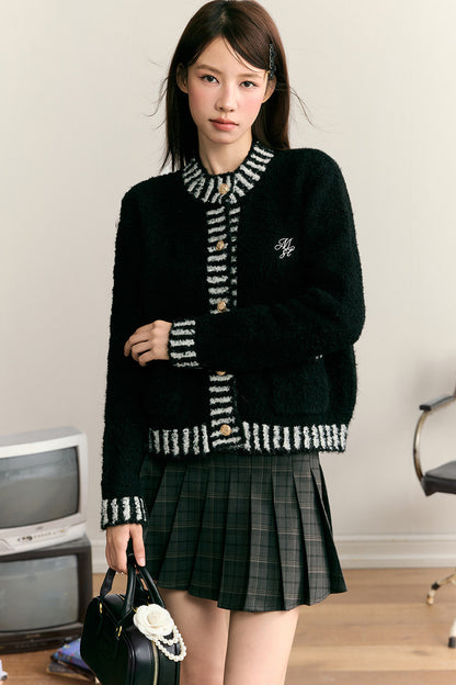 Top cardigan pesante a toppe