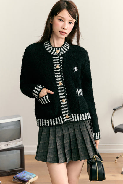 Top cardigan pesante a toppe