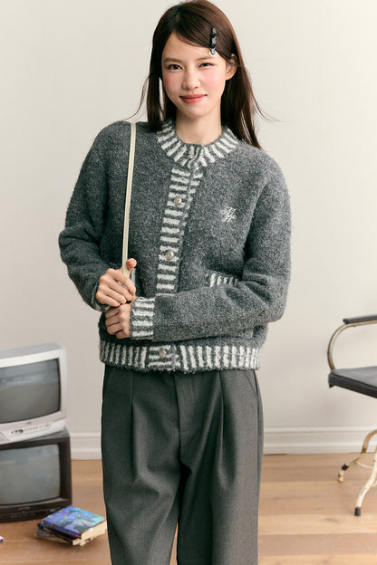 Top cardigan pesante a toppe