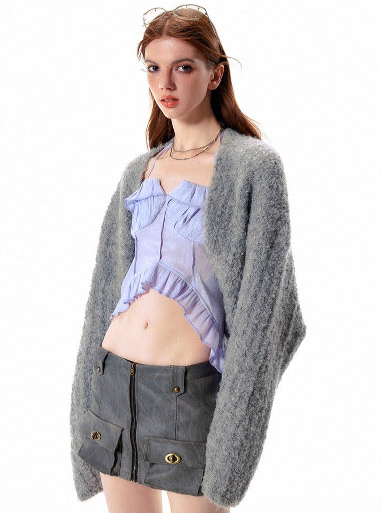 Denim tank top and knitted outer jacket