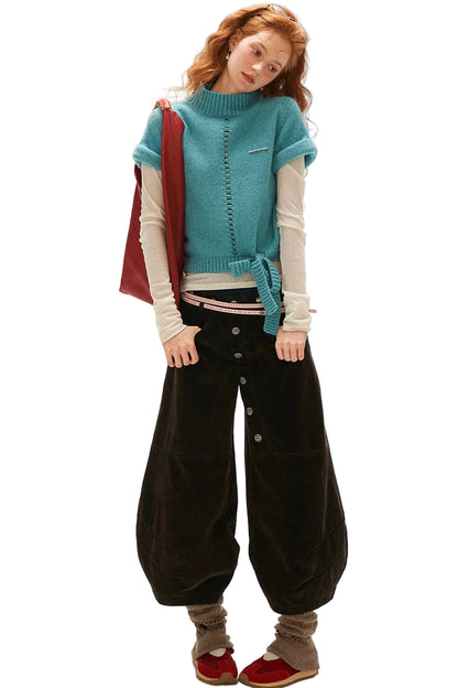 Jeans cropped a quadri con applicazioni floccate e a toppe