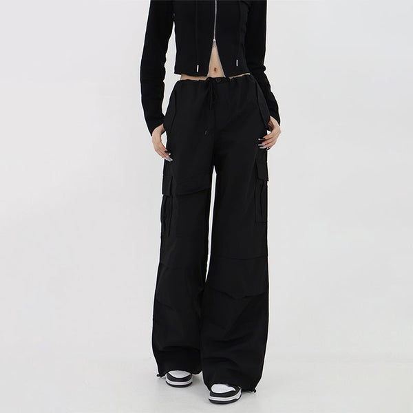 Pants with waist adjustment hem drawcord