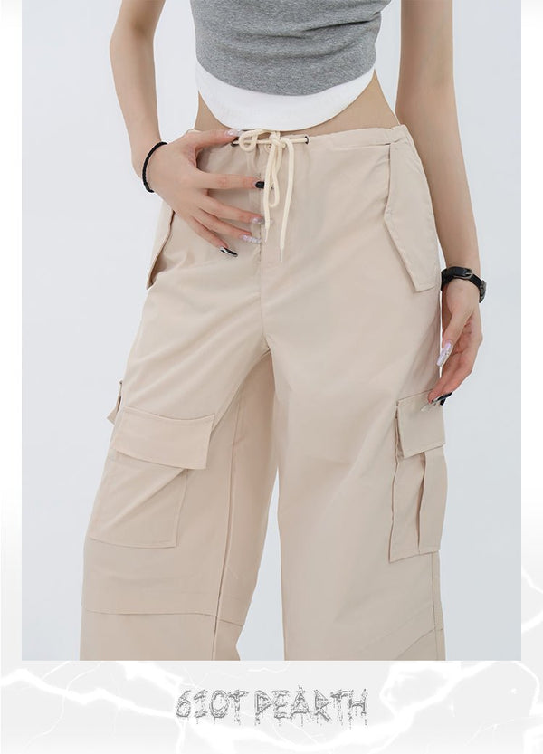Pants with waist adjustment hem drawcord