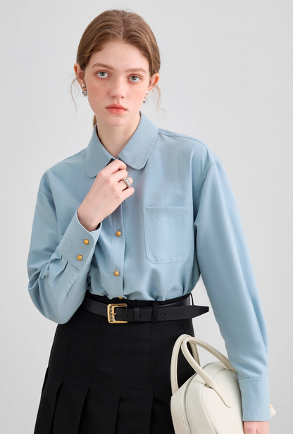 Light blue gold button shirt