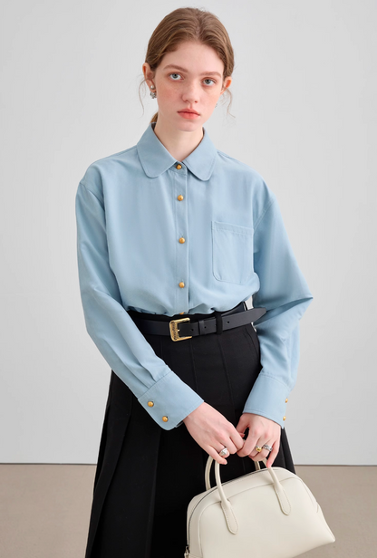 Light blue gold button shirt