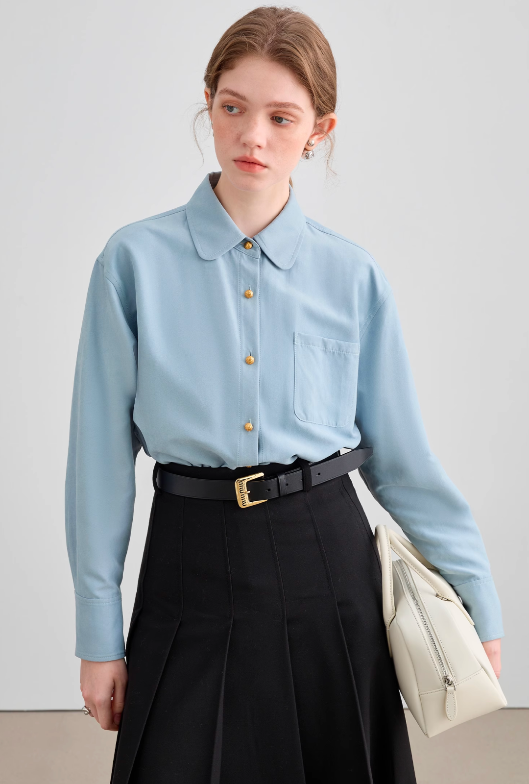 Light blue gold button shirt