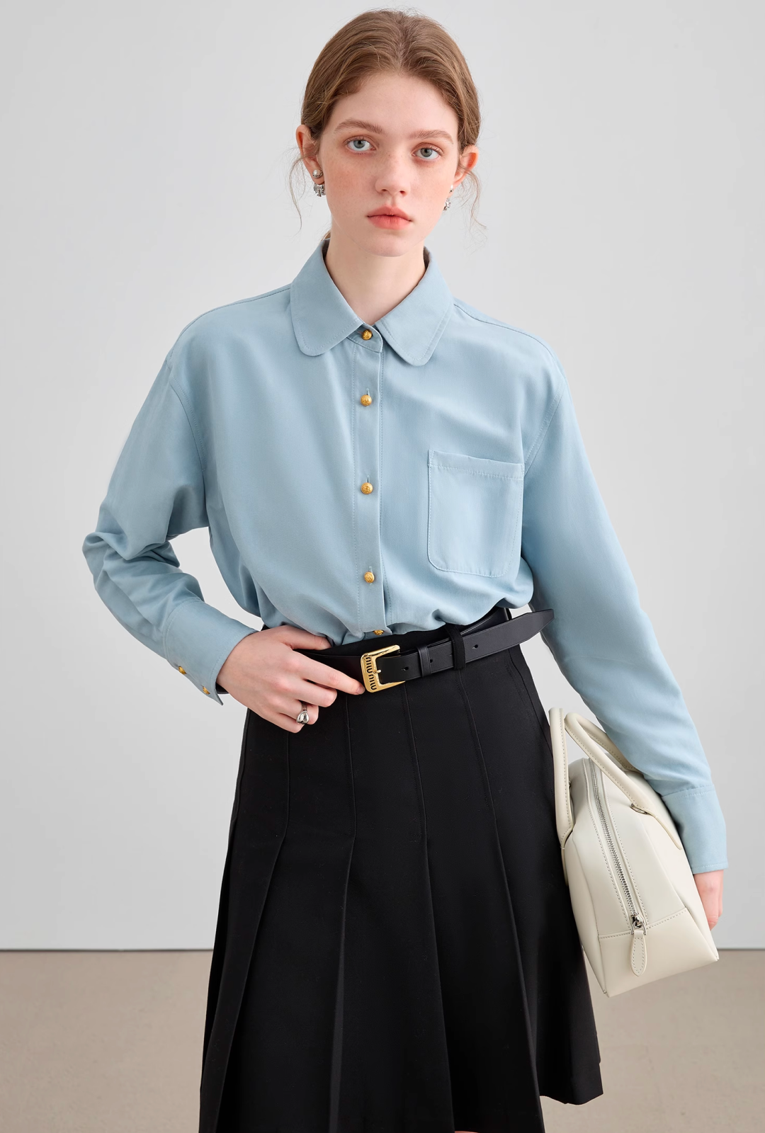 Light blue gold button shirt