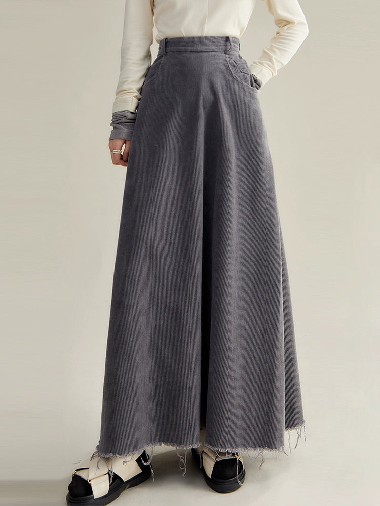 Tasseled raw A-line skirt