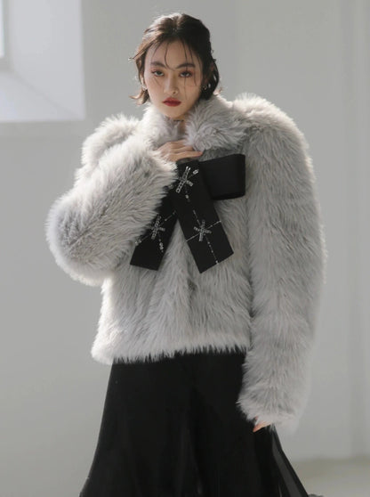 Hand-beaded bows embellished faux-fur coat
