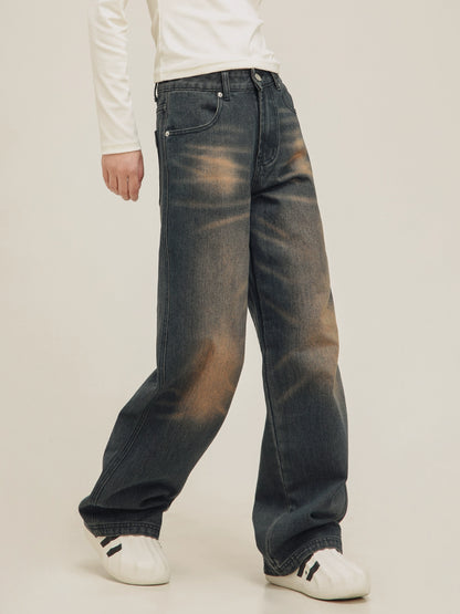 washed distressed draped jeans pants