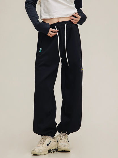 American label embroidered sweat pants