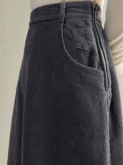 Tasseled raw A-line skirt