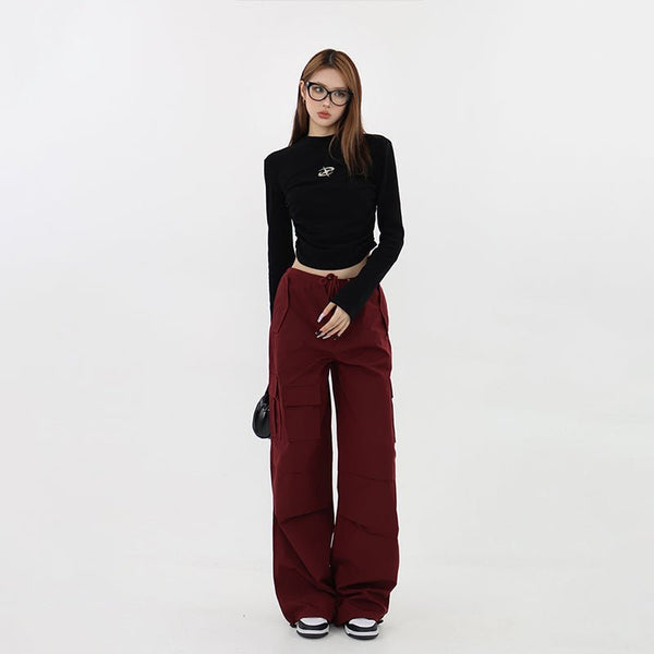 Pants with waist adjustment hem drawcord