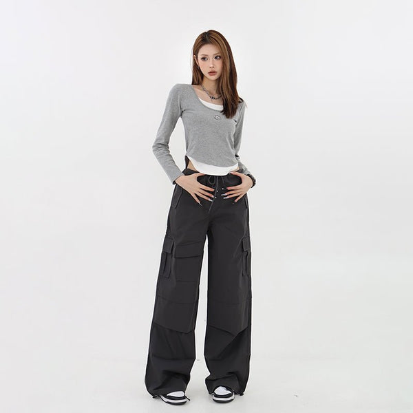 Pants with waist adjustment hem drawcord